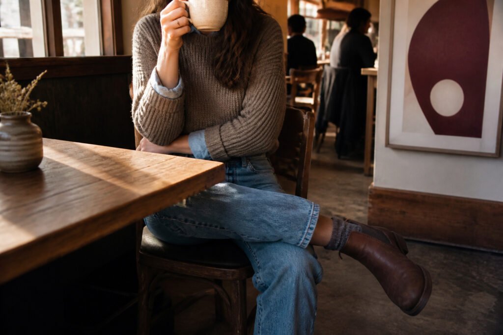 A collection of casual winter outfits displayed in a stylish setting.